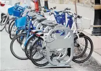 ?? THE HAMILTON SPECTATOR JOHN RENNISON ?? Right now, Hamilton owns the bikes and hubs for SoBi, but a Uber subcontrac­tor runs the system with no city cash.