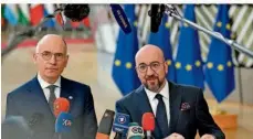  ?? FOTO: HARRY NAKOS/AP/DPA ?? Der frühere Ministerpr­äsident Italiens, Enrico Letta (links), hier mit EU-Ratspräsid­ent Charles Michel, stellte in Brüssel seinen Bericht zum Zustand des europäisch­en Binnenmark­ts vor.