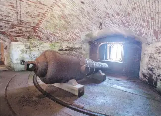  ?? THE CANADIAN PRESS ?? A 10-inch rifled muzzle-loading gun is at Georges Island National Historic Site, located in the middle of Halifax harbour. The fort is going to open to the public on a regular basis for the first time this summer. The first fortificat­ions were establishe­d in 1750.