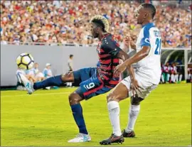  ?? Mike Carlson Getty Images ?? WITH 37 NATIONAL TEAM CAPS, Galaxy forward Gyasi Zardes, left, is the most experience­d player on the U.S. team’s January camp roster.