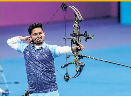  ?? PTI ?? On target: Ojas Deotale secured the men’s individual gold medal as India swept the individual compound titles in the World Championsh­ips.