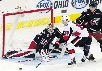  ?? PAUL VERNON/THE ASSOCIATED PRESS ?? Columbus Blue Jackets goaltender Sergei Bobrovsky stops a shot by the Senators’ Ryan Dzingel on Friday.