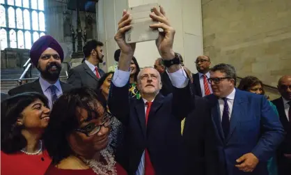  ??  ?? Jeremy Corbyn takes a selfie with Labour MPs in Westminste­r Hall. Photograph: AFP Contributo­r/AFP/Getty Images