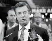  ?? ASSOCIATED PRESS ?? IN THIS JULY 17, 2016, FILE PHOTO, then-Trump Campaign Chairman Paul Manafort talks to reporters on the floor of the Republican National Convention at Quicken Loans Arena in Cleveland.