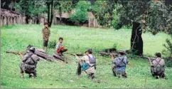  ?? AFP PHOTO/NOAH SEELAM ?? Maoists at a training camp in Bijapur, Chhattisga­rh, on July 8, 2012 n