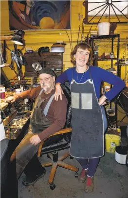  ?? Catherine Bigelow / Special to The Chronicle ?? Dan Macchiarin­i and daughter, Emma, in their North Beach atelier-gallery.