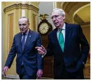  ?? AL DRAGO / NEW YORK TIMES ?? Senate Majority Leader Mitch McConnell, R-Ky., (right) may cancel the August recess to fight Democratic opposition, led by Senate Minority Leader Chuck Schumer (D-N.Y.), to GOP priorities.