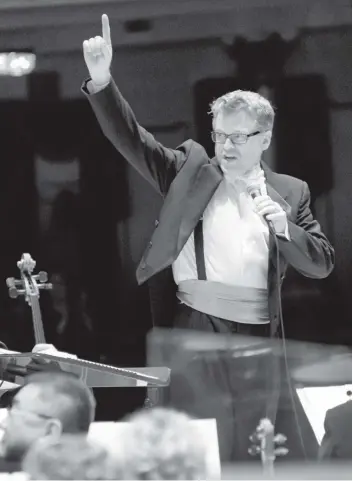  ?? [SUBMITTED] ?? Conductor John Morris Russell will be leading the Kitchener-Waterloo Symphony in a performanc­e where audience members are encouraged to use their smart phones to vote on the next piece to be played.