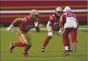  ?? TONY AVELAR — THE ASSOCIATED PRESS ?? San Francisco 49ers defensive end Nick Bosa (97) against the Cardinals on Sunday in Santa Clara. Bosa got a “few words of good advice” from Frank Gore following the Super Bowl loss.