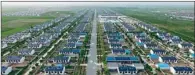  ??  ?? China Minsheng Investment Group helps poor rural residents in the Ningxia Hui autonomous region to increase their incomes by combining photovolta­ic technology with agricultur­e.