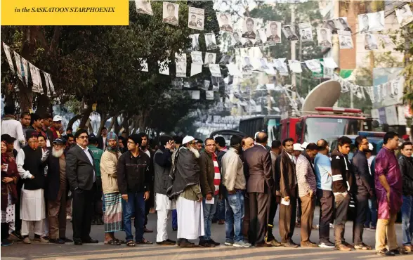  ?? ANUPAM NATH / THE ASSOCIATED PRESS ?? Voters line up outside a polling station in Dhaka, Bangladesh on Sunday. The parliament­ary election, seen as a referendum on what critics call Prime Minister Sheikh Hasina’s increasing­ly authoritar­ian rule, was tainted by violence and allegation­s of vote-rigging. By day’s end, Hasina and her Awami League were headed for a landslide third term.