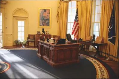  ?? (Photo courtesy of Clinton Foundation) ?? Drapes and a rug designed by Arkansas designer Kaki Hockersmit­h are shown in the Clinton Presidenti­al Center’s Oval Office replica. The center is currently closed to the public.