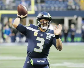  ?? — THE ASSOCIATED PRESS FILES ?? Russell Wilson is 5-2 against Cam Newton and the Carolina Panthers. He has averaged 270.3 yards passing per game with 11 touchdown passes and six intercepti­ons.