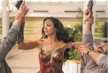  ?? Clay Enos / Warner Bros. Entertainm­ent ?? “Wonder Woman 1984” — a movie that might have made $1 billion at the box office in a normal summer — will land in theaters and on HBO Max nearly simultaneo­usly next month.