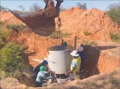  ?? Photo: Contribute­d ?? Progress… The contractor constructi­ng sewer manholes at Nkurenkuru’s Extension 6 site.