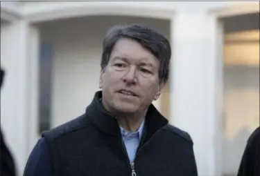  ?? THE ASSOCIATED PRESS ?? In this photo taken Nov. 8, 2016, then-New York’s 19th Congressio­nal District Republican candidate, now-Rep. John Faso, R-N.Y., talks with media members after voting in Kinderhook, N.Y.