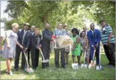  ?? RICK KAUFFMAN – DIGITAL FIRST MEDIA ?? Chester Mayor Thaddeus Kirkland and hotel developer Sam Patel break ground alongside members of city council and crucial members of the city who helped bring the Candlewood Suites downtown.