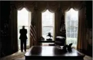  ?? ANDREW HARNIK — ASSOCIATED PRESS FILE ?? President Donald Trump is photograph­ed in the Oval Office in Washington last April.