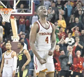  ?? Michael Owen Baker Associated Press ?? IT WAS QUITE a season for Chimezie Metu, who averaged 15.9 points and 7.4 rebounds as the Trojans finished second in the Pac-12. He might be a first-round pick if he chooses to go to the NBA.