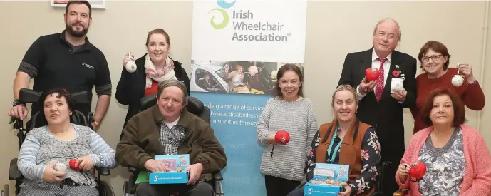  ??  ?? Members of the local Irish Wheelchair Associatio­n launched their Angel fundraiser last week. Pictured are Trevor Walsh, Claire McLoughlin, Veronica Campbell, Mayor Godfrey, Bernadine Keegan, Barbard Ward, Martin Somerville, Nicola McDonnell and Brenda Coogan.