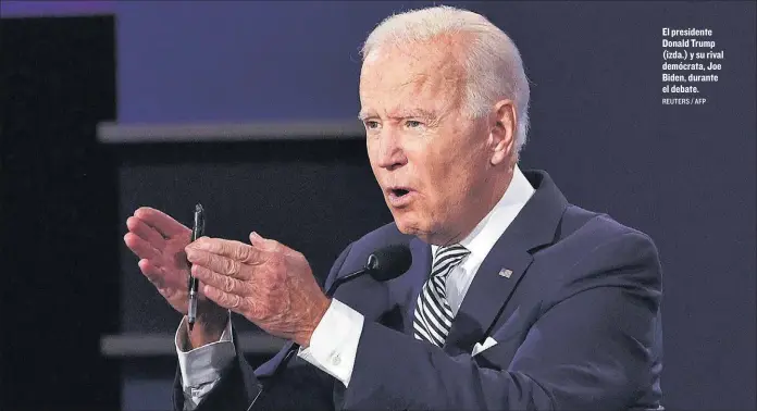  ?? REUTERS / AFP ?? El presidente Donald Trump (izda.) y su rival demócrata, Joe Biden, durante el debate.