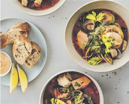  ?? PHOTOS: KEVIN CLARK ?? Chef Ned Bell showcases a variety of sustainabl­e seafood in his West Coast bouillabai­sse.