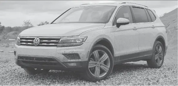  ?? JIL MCINTOSH/DRIVING ?? The 2018 Volkswagen Tiguan has been outfitted with a 2.0-litre turbocharg­ed engine aimed to beef up power and reduce gas consumptio­n, replacing its diesel model.