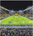  ?? FOTO: GUIDO KIRCHNER/DPA ?? Da will die Liga wieder hin: volles Haus in Dortmund.