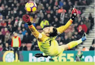  ?? PHOTO: REUTERS ?? Full stretch . . . West Ham’s Lukasz Fabianski makes a save during the match against Southampto­n yesterday.