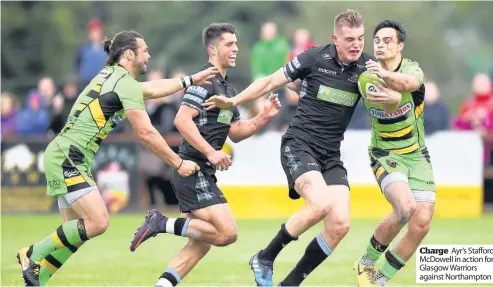  ??  ?? Charge Ayr’s Stafford McDowell in action for Glasgow Warriors against Northampto­n