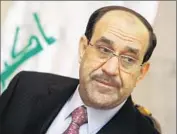  ?? Ahmad al-Rubaye AFP/Getty Images ?? “HE TREATED everyone equally,” one supporter said of Prime Minister Nouri Maliki, pictured in 2011.