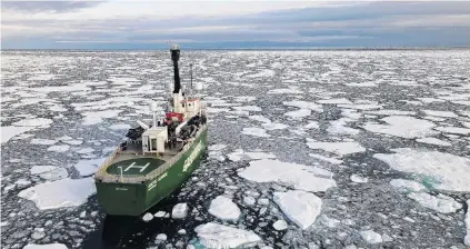  ?? PHOTO: REUTERS ?? Too easy . . . Greenpeace's Arctic Sunrise ship navigates through floating ice in the Arctic Ocean last month. The summer melt season ended on September 15, with just over a quarter of the winter ice left.