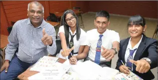  ?? ZANELE ZULU African News Agency (ANA) ?? PRINCIPAL of Crystal Point Secondary School in Phoenix, Sagie Moodley, said his pupils were ready for the matric exams. From left are Eden Moodley, Cameron Andrews and Bianca Meghraj.