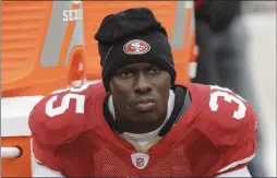  ?? PAUL SAKUMA ?? FILE - In this Oct. 17, 2010 file photo, San Francisco 49ers cornerback Phillip Adams (35) sits on the sideline during the first quarter of an NFL football game in San Francisco.