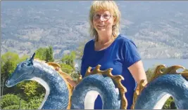  ?? SUSAN MCIVER/Special to The Daily Courier ?? Artist Valorie Nielsen created Summerland’s first sculpture of Ogopogo at the request of a local couple.