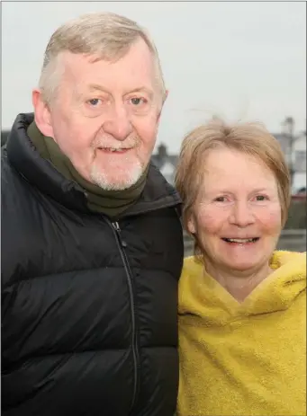  ??  ?? Jer Rellis and Paula Clinton at the Slade New Year’s Day swim.