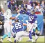  ?? Elsa / Getty Images ?? The Giants’ Nick Gates (65) in action against the Dolphins in December.