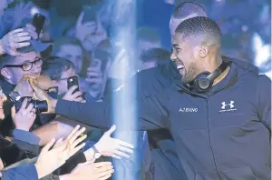  ?? Getty. ?? Anthony Joshua greets fans at yesterday’s weigh-in in Cardiff.