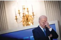  ?? (Tom Brenner/Reuters) ?? US PRESIDENT Joe Biden stands in a moment of contemplat­ion before speaking during a roundtable discussion on public safety from the State Dining Room at the White House, on Wednesday.