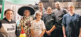  ?? PHOTOS: SHANNON THOMSON ?? Taking over . . . The Cromwell Youth Trust took over Amigos restaurant for two nights last week. From left are Jack Rogan (11), Carli Hutchinson (12), Will Stephenson (11), Amigos restaurant supervisor Anderson Horler, Olivia Kihi (11), head chef Kunal Nerurkar and sous chef Antonia McNair.