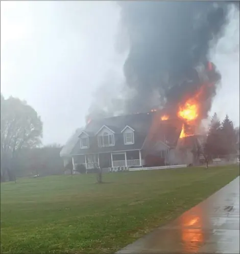  ?? SUBMITTED ?? A Lorain County family lost their residence to a fire on Gore Orphanage Road in Brighton Township last month. No injuries were sustained.