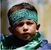  ?? Reuters ?? A Palestinia­n boy wearing a headband attends a protest against Israel’s annexation plan, in Gaza.