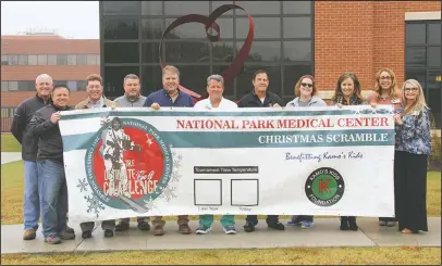 ?? Submitted photo ?? SCRAMBLE SET: Members of Kamo’s Kids Foundation and sponsors pose in front of the Heart and Vascular Center of Central Arkansas. Pictured are, from l-r, Tiger Williams, Steve Qualls, Joseph Patrico, Brian Bales, Dr. Kevin Hale, Dr. Donald Ivy, Gordon...