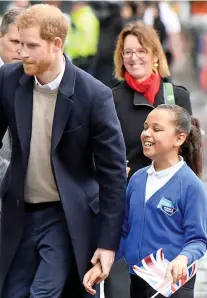  ??  ?? Walk this way: Harry takes Sophia by the hand