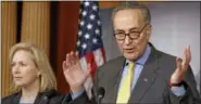  ?? JACQUELYN MARTIN — THE ASSOCIATED PRESS ?? U.S. Sens. Charles Schumer, D-N.Y., right, and Kirsten Gillibrand, D-N.Y, speak on Capitol Hill in Washington in this photo from Jan. 4, 2013.