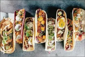  ?? CONTRIBUTE­D BY VELVET TACO ?? Tacos from Velvet Taco.