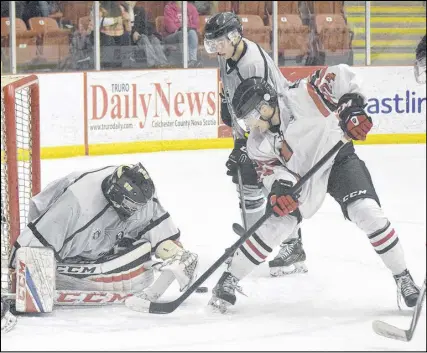  ?? TRURO DAILY NEWS PHOTO ?? The Truro Bearcats upped their MHL preseason record to two wins against no losses with a 4-1 victory over the visiting Valley Wildcats Saturday night at the RECC. Here, the Bearcats’ Elliott McGuire looks for a loose puck in the Valley goalmouth.