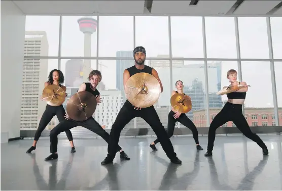  ?? GAVIN YOUNG ?? Dancers from Decidedly Jazz Danceworks engage in a “sensual” battle where they use their cymbals as shields in one of 10 scenes that make up their new show, Velocity.