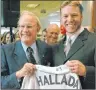  ?? CP PHOTO ?? Toronto Blue Jays pitcher Roy Halladay, right, and Rogers Communicat­ions Inc. president and CEO Ted Rogers smile during a press conference in Toronto in 2004, after Halladay signed a four year, $42 million contract with the Blue Jays.