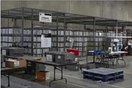  ?? BRIDGET BENNETT — THE NEW YORK TIMES ?? Sealed ballot boxes sit in storage after the 2022 midterm elections at Clark County Election Department in North Las Vegas. Activists have escorted landlords to the Clark County registrar's office to flag registrati­ons of former tenants.